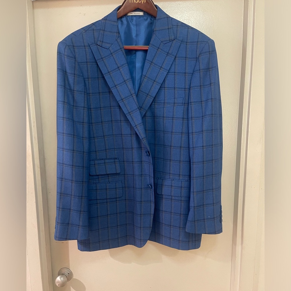 Blue 2 button black and dark grey striped three piece suit.